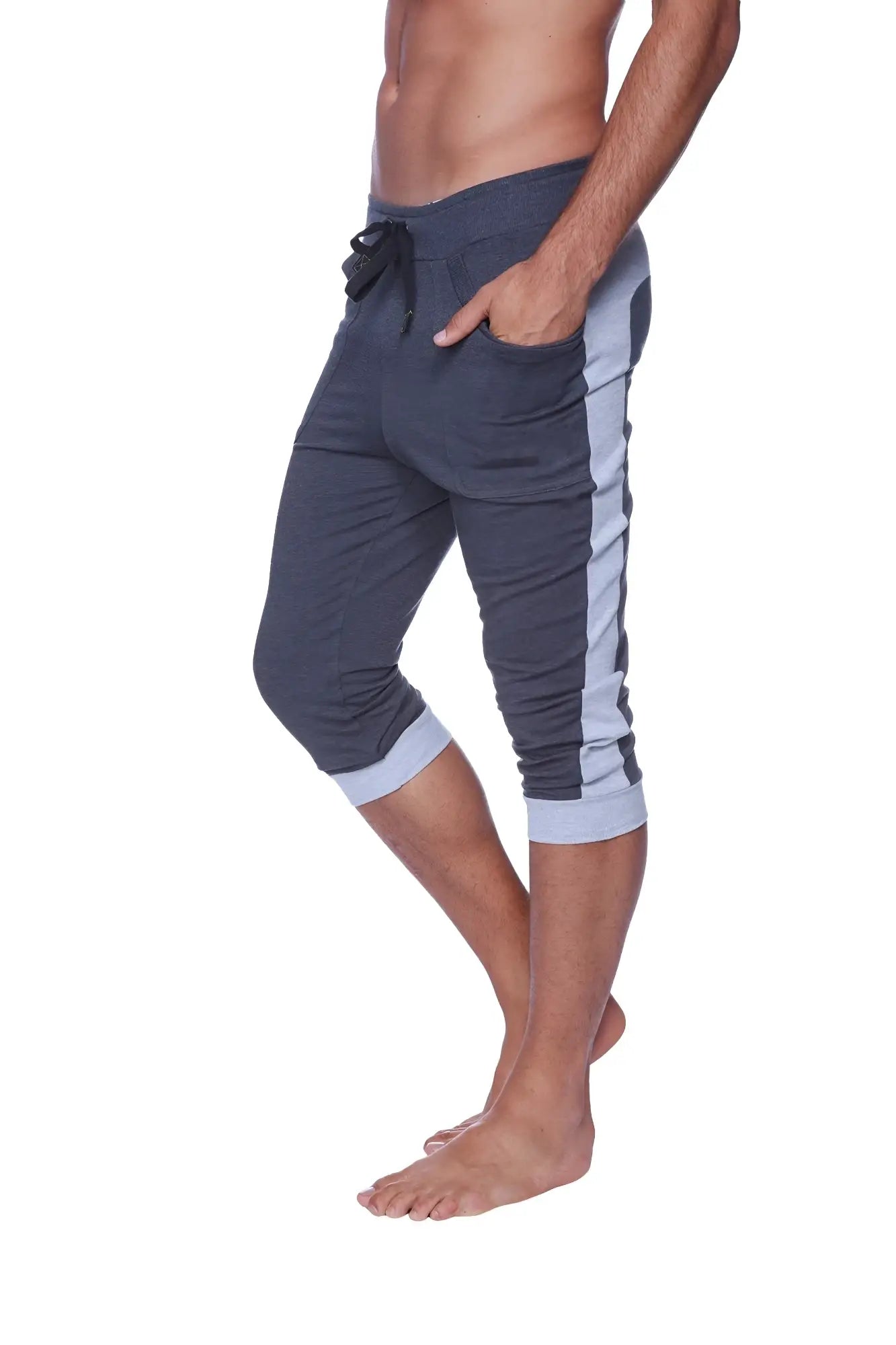 Mens cuffed yoga pants in charcoal with heather grey featuring dark gray capri joggers and light blue side stripes