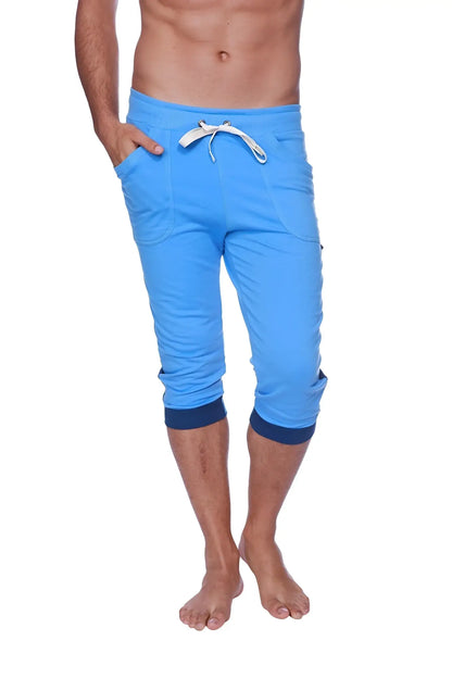 Mens cuffed yoga pants in ice blue with bright blue capri length navy cuffs and a white drawstring waistband