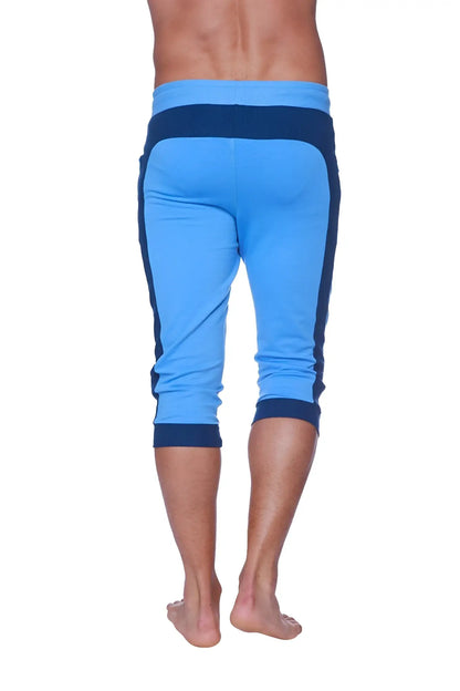 Mens cuffed yoga pants in ice blue with royal blue stripe down sides designed for athletic wear