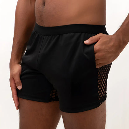 Black athletic mesh back short with solid fabric waistband and breathable mesh side paneling for active use