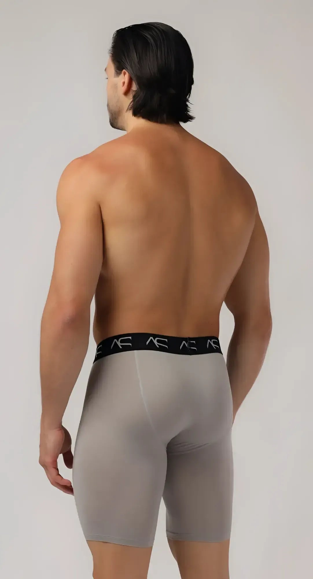 Gray menâs mesh long trunks compression briefs with black elastic waistband featuring white ae logos