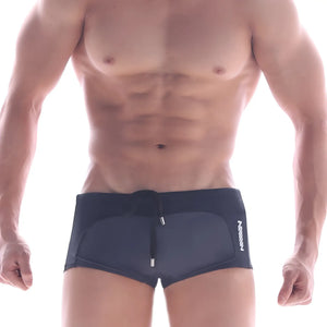 Dark navy swim trunks with sleek modern design and white logo on side metroMalewear arc swim boxer heather 4925-11