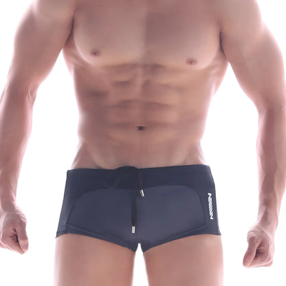 Dark navy swim trunks with sleek modern design and white logo on side metroMalewear arc swim boxer heather 4925-11