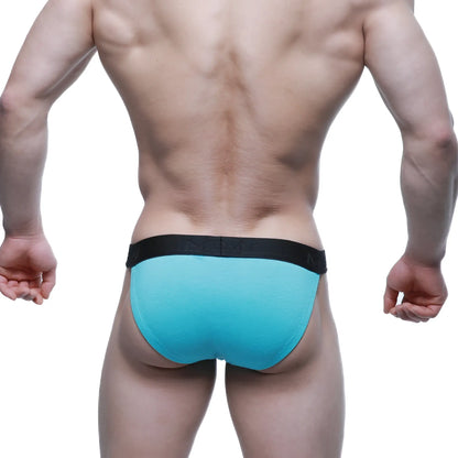 Turquoise athletic briefs with a black elastic waistband featuring the metro male wear brand logo neo blue 3004-71