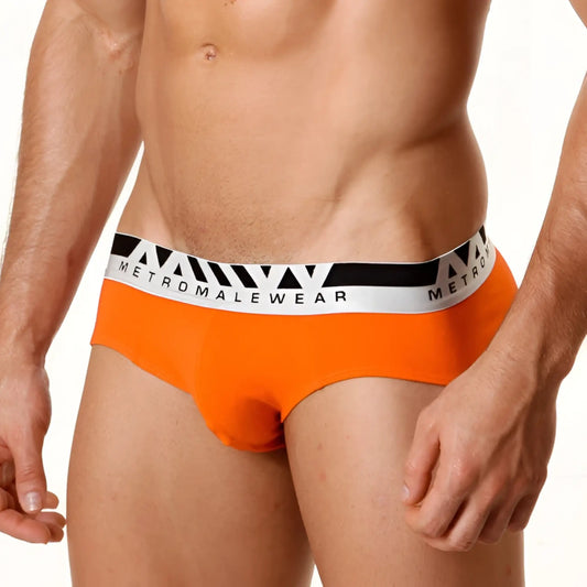 Bright orange metro malewear asian briefs with white and black elastic waistband featuring the brand logo