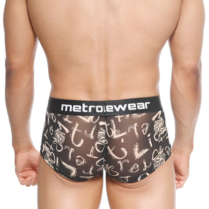 Black mesh briefs with white graffiti lettering and a black metroewear logo waistband titled metroMalewear asian trunk oraculo 2026-03