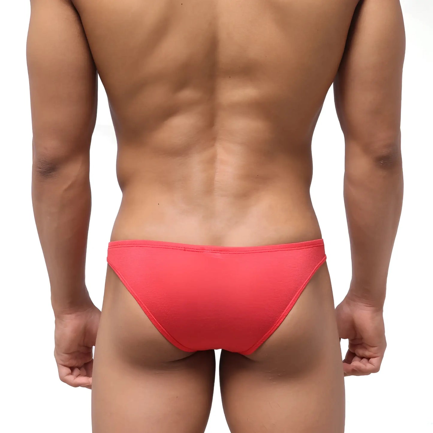 Bright coral-red metroMalewear bosillo half back bikini briefs with textured seamless fabric shown from the back side
