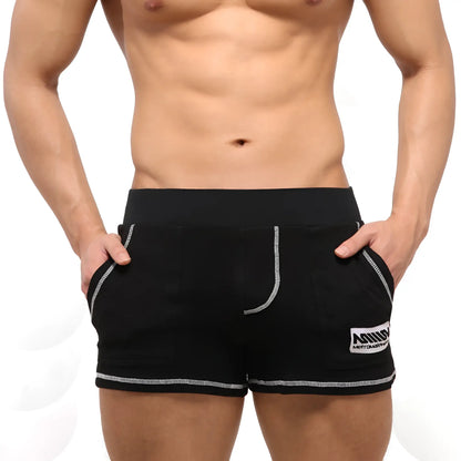 Metro male wear boston black athletic shorts with white stitched trim and mind mettomar logo patch on lower right leg