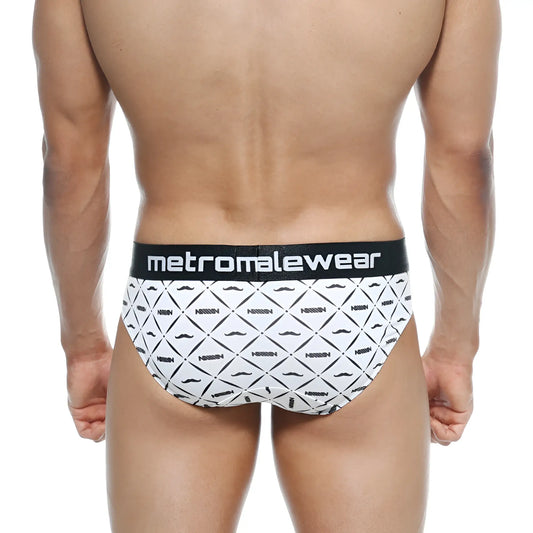 White briefs metroMalewear brief caballero 5006-03 with black mustache print and black waistband with metroMalewear logo