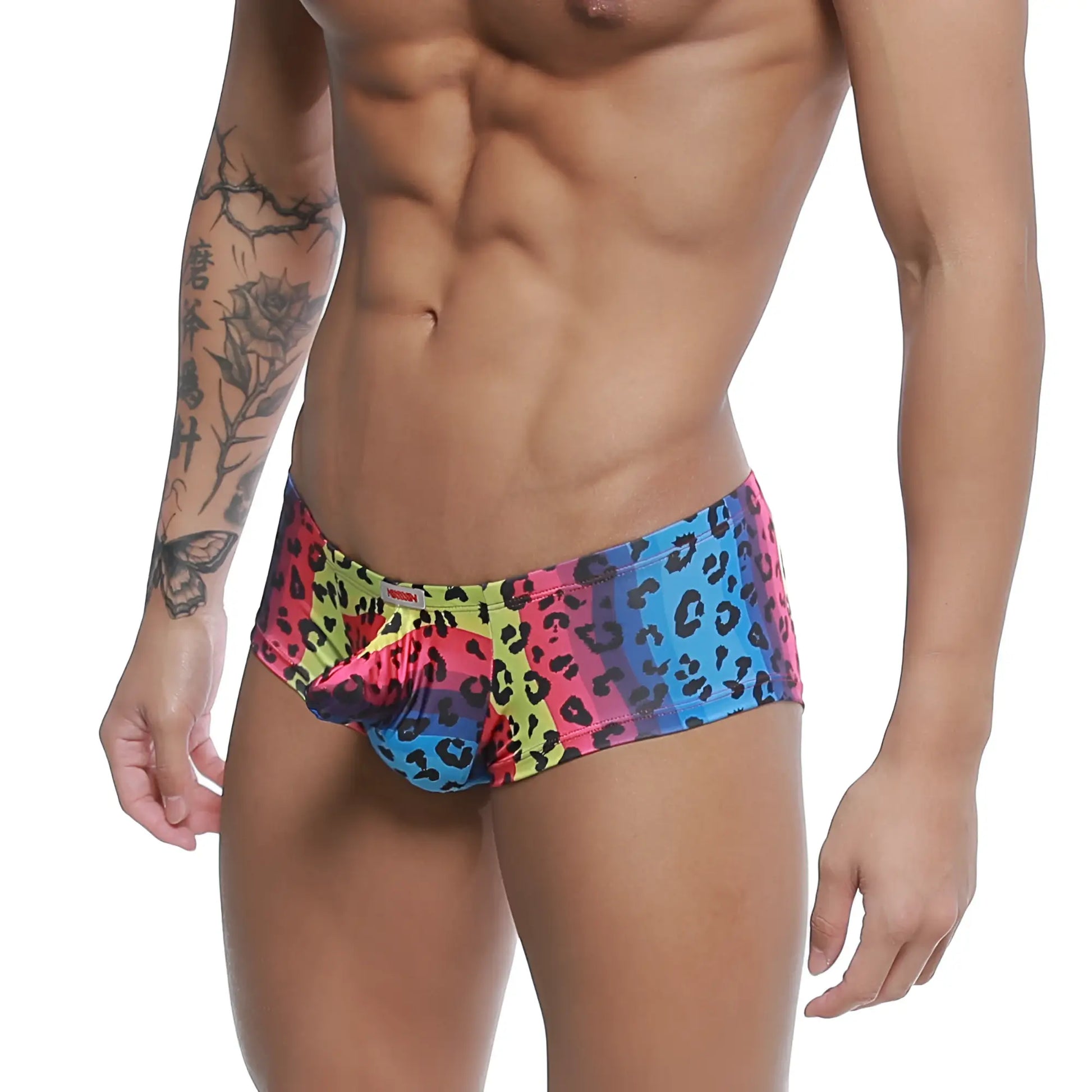 MetroMaleWear cannon boxer neon swim trunks with vibrant multicolored leopard print and bold pink blue yellow gradient design