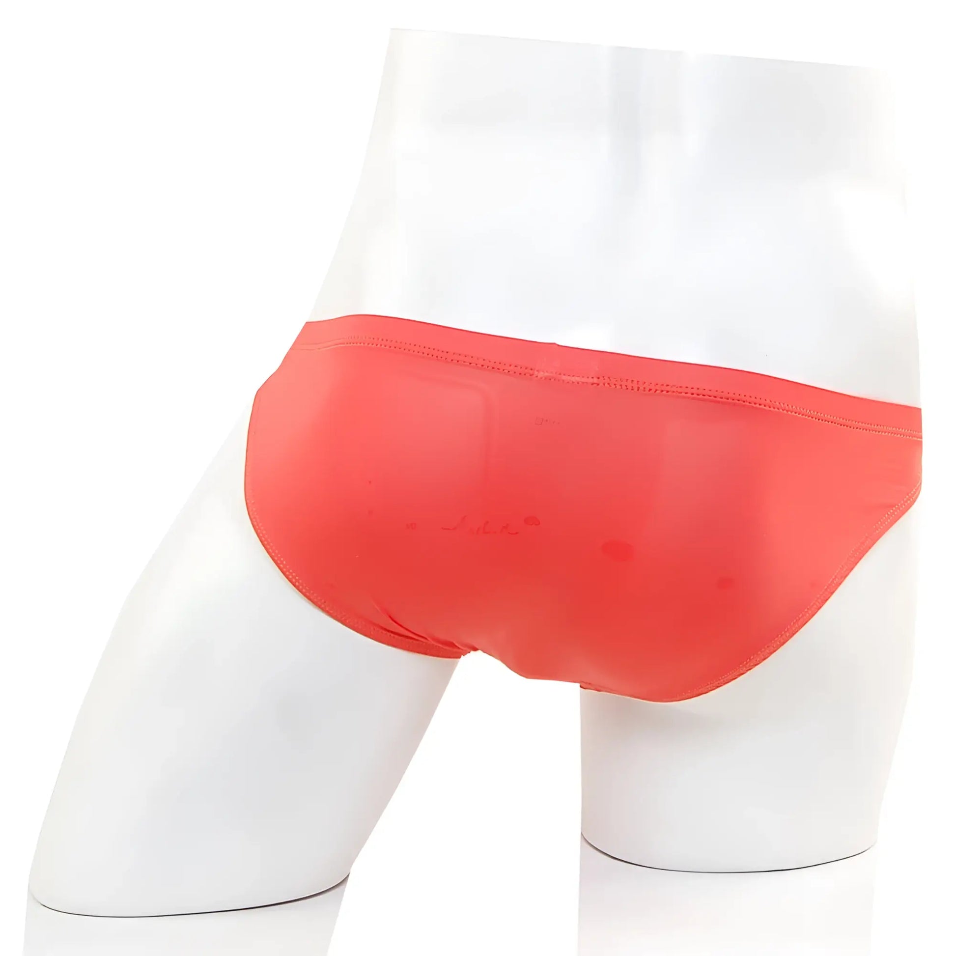 Bright coral metro male wear cannon hip brief swim trunks with smooth stretchy fabric and sleek design