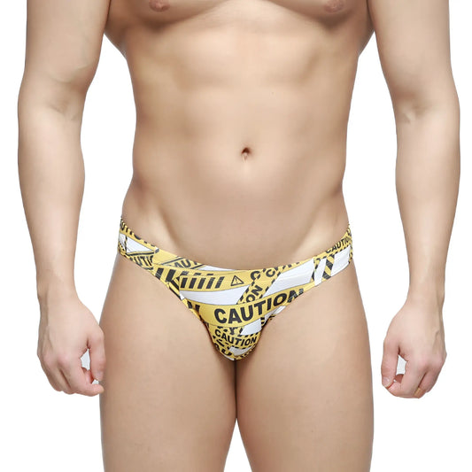 MetroMalewear caution bikini white 5103-m60 swim trunks with yellow and black caution tape pattern for swimwear use