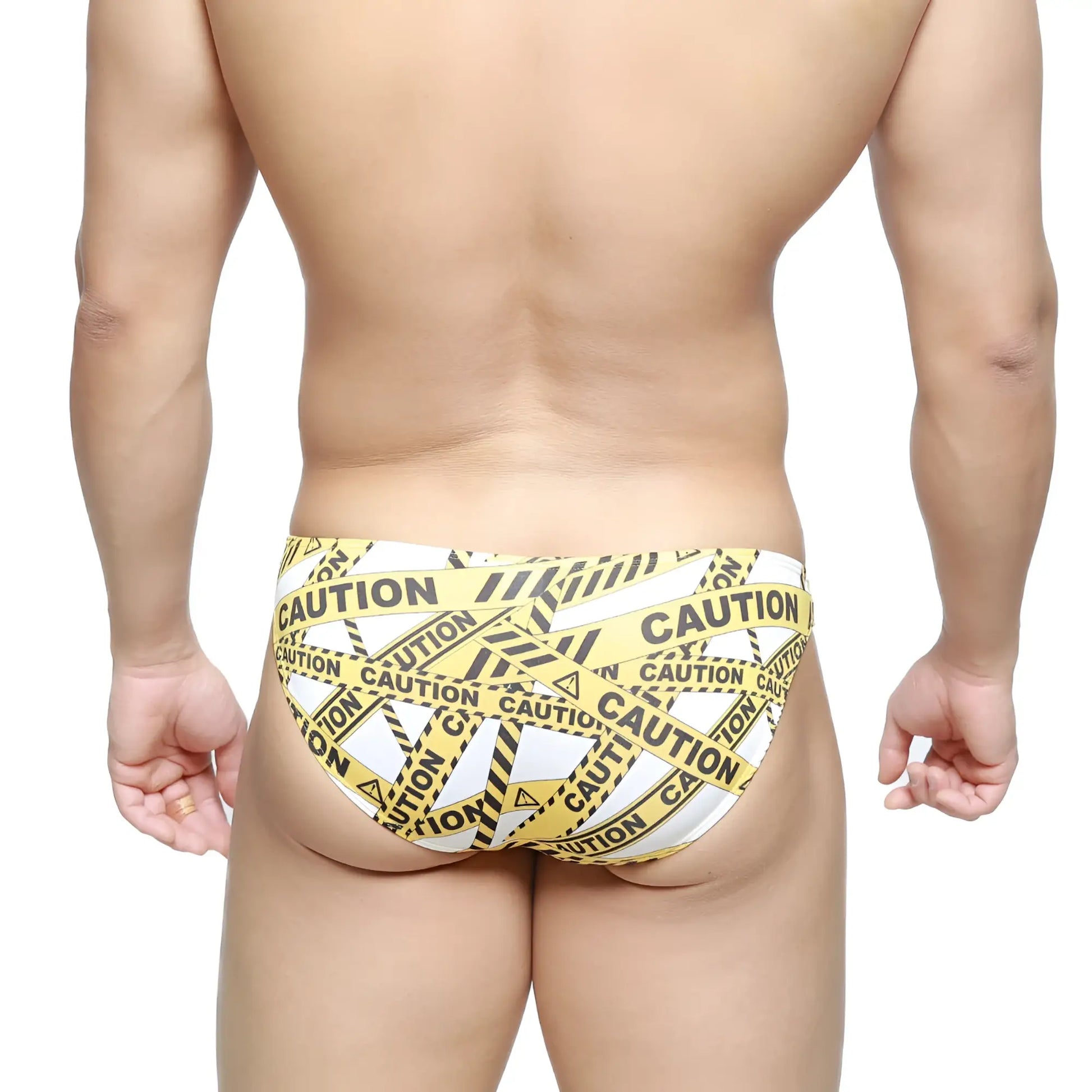 MetroMaleWear caution lowrise bikini swim trunks with yellow and black caution tape pattern in white 6115-60 fabric