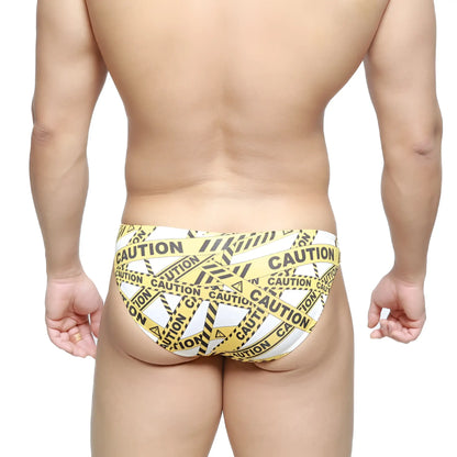 MetroMaleWear caution lowrise bikini swim trunks with yellow and black caution tape pattern in white 6115-60 fabric