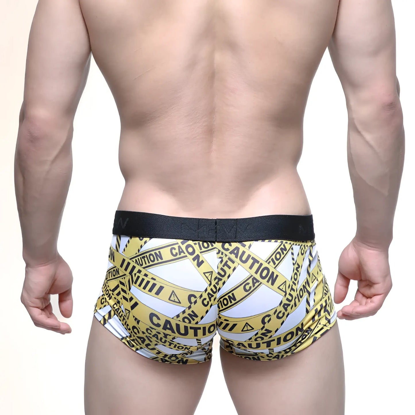 Metro male wear caution trunk white 2026 69 men’s briefs with white and yellow caution tape pattern and black waistband