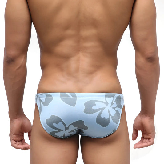 Light blue MetroMaleWear Classic swim bikini with bold gray hibiscus flower pattern ideal for beachwear