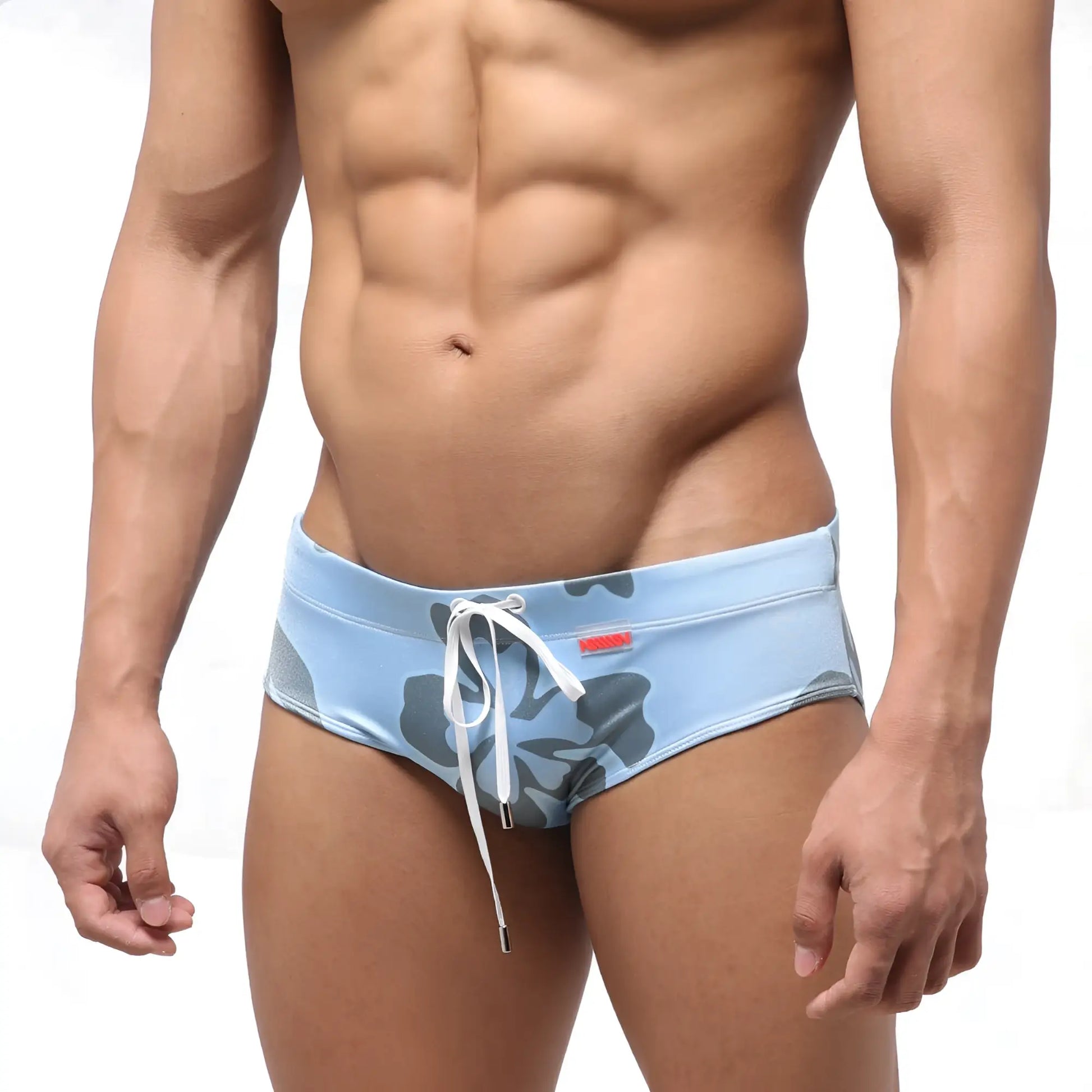 Light blue MetroMaleWear classic swim briefs with gray floral pattern and white drawstring for swimming use