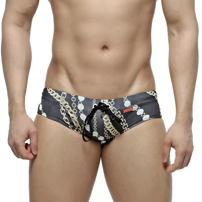 Black swim trunks metro malewear classic swim brief rico 4914-95 with bold gold and white chain-link pattern and matching drawstring
