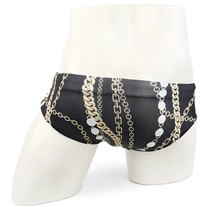 Black MetroMaleWear classic swim brief Rico 4914-95 with bold gold and silver chain and medallion pattern
