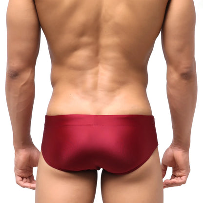 MetroMaleWear classic swim brief wine 4914-42 is a sleek satin-finish red snug fit swim trunk with a smooth design