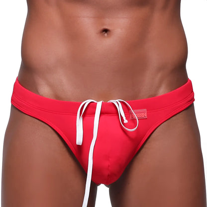 MetroMaleWear classic swim thong red with white drawstrings and small brand tag designed for beachwear use