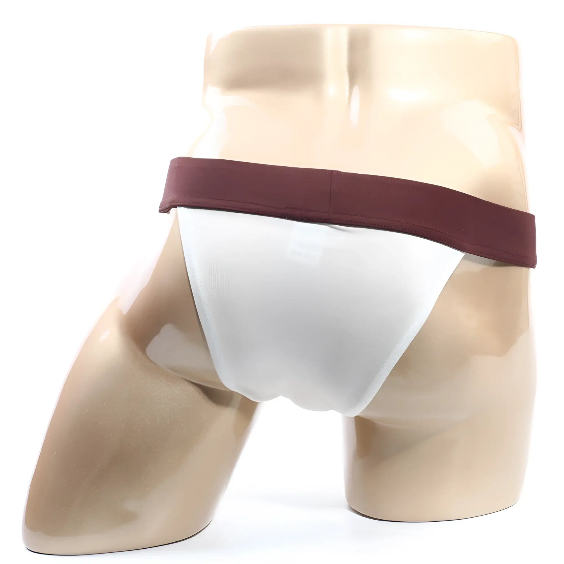 White MetroMaleWear Cosmos bikini briefs with maroon waistband displayed on a mannequin in cream fabric