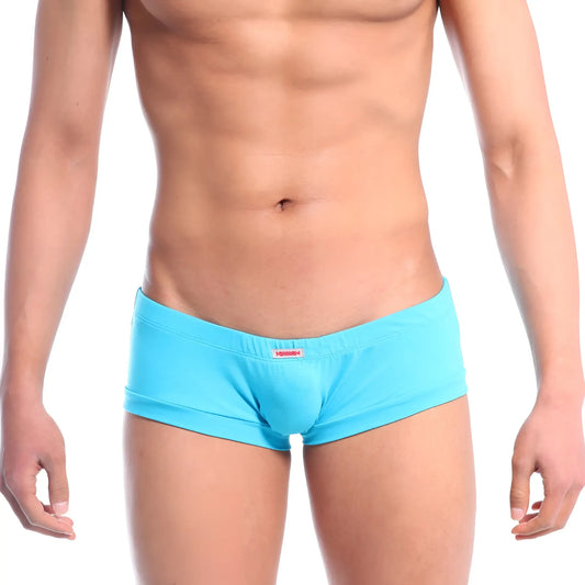 Bright turquoise MetroMaleWear Cotton Boxster Neo Blue 3010-08 men’s briefs with snug fit and red brand tag