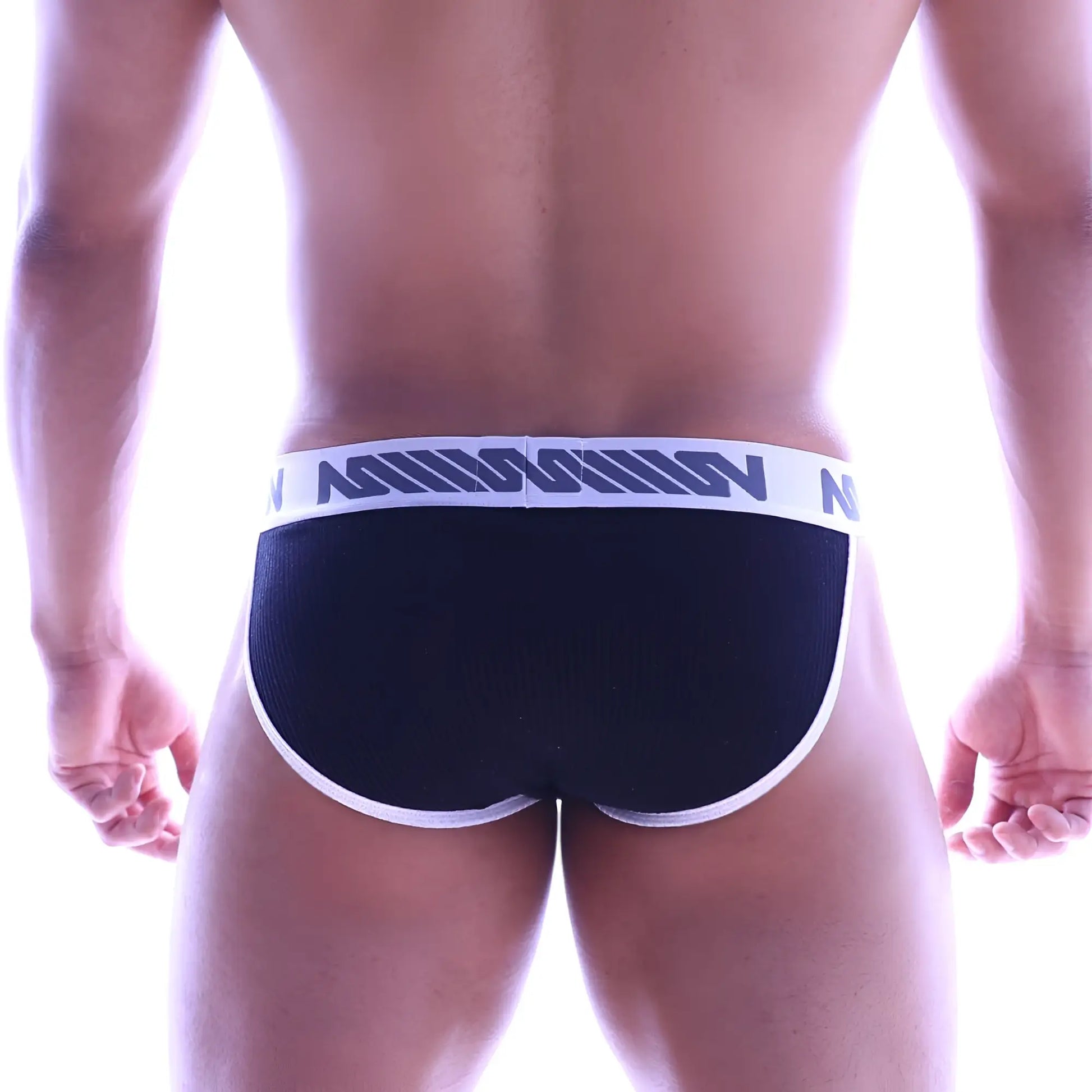 Black cotton ribbed MetroMaleWear athletic briefs with a white elastic waistband and dark blue logo pattern