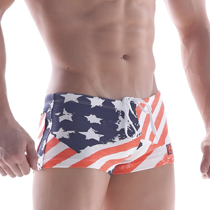 MetroMaleWear cotton swim trunks with American flag distressed design featuring navy blue white and red stripes and stars