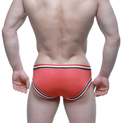 Orange textured briefs with black and white striped trim from MetroMaleWear Cupid Bikini Red 6105-12 product line