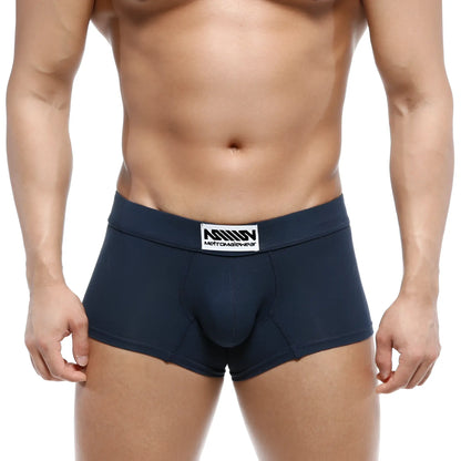 Navy blue MetroMaleWear deseo boxer briefs with a white branded label featuring logo and brand name metromalewear