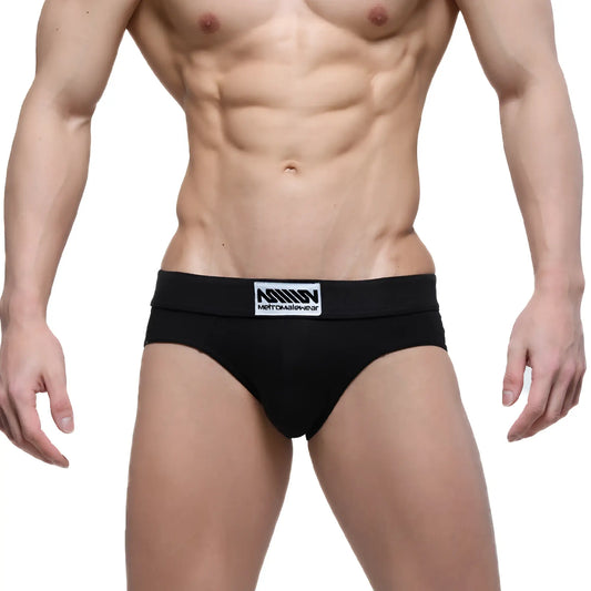 Black men’s briefs with a white logo patch on the waistband from metromalewear deseo brief pearl 5503-22 collection