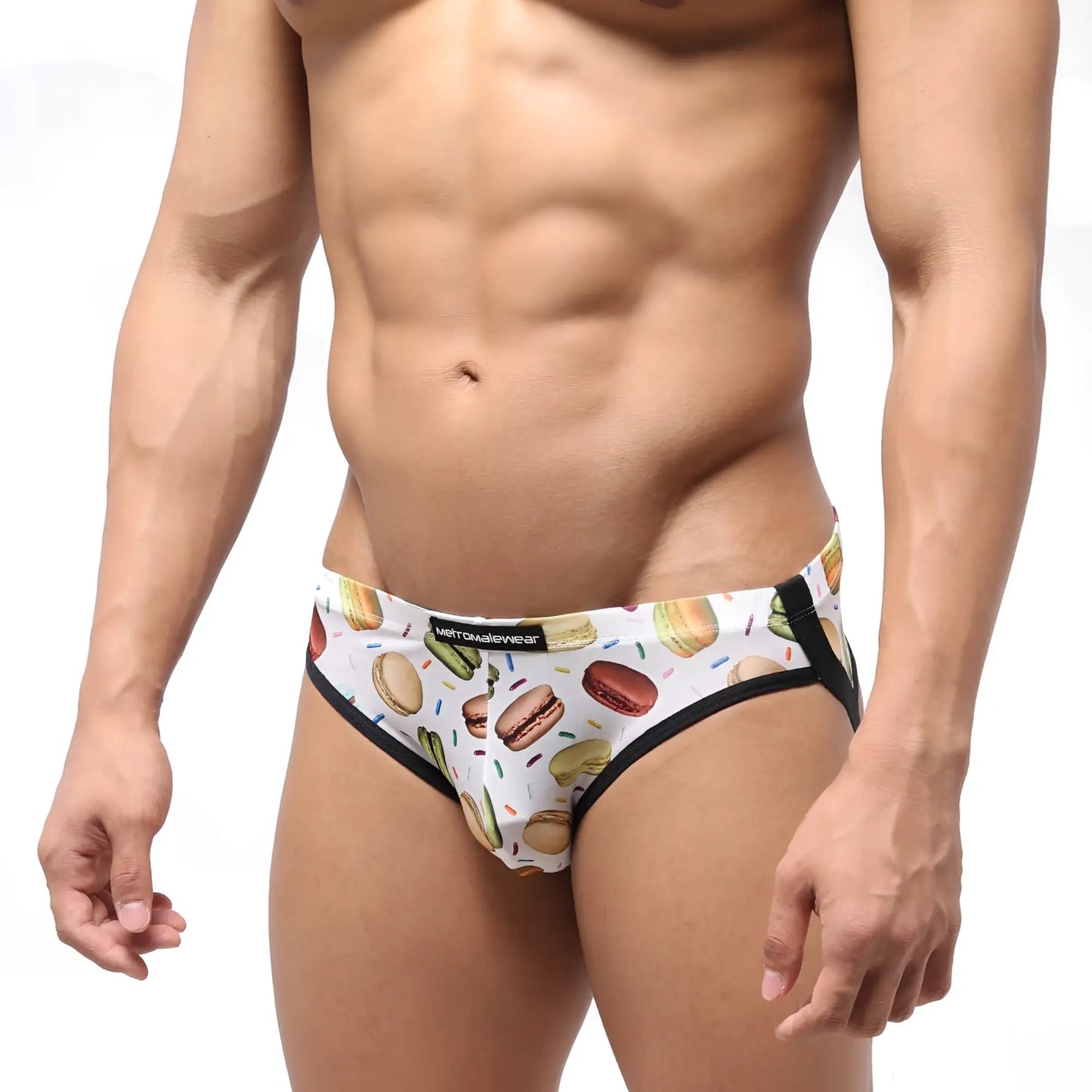 White men’s briefs by metromalewear featuring playful macaron hot dog and candy sprinkle pattern with black trim