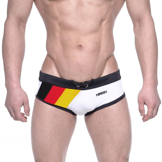White swim trunks with black trim and a bold german flag design on the side by ammy from metromalewear