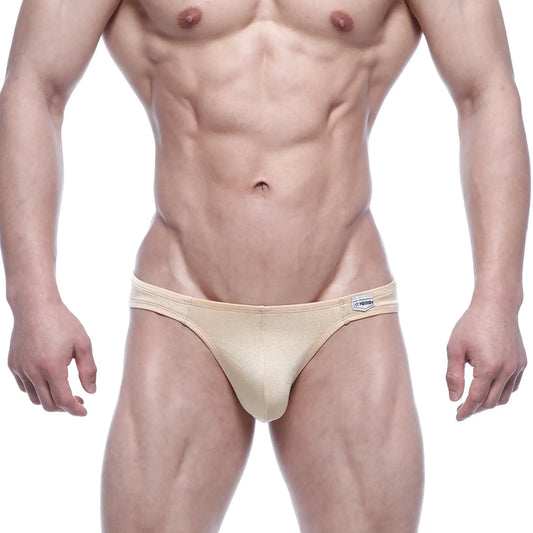 Beige form-fitting briefs with subtle sheen and small metro male wear brand tag on waistband metro male wear eureka bikini gold 5223-21