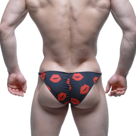 Black MetroMaleWear Fantasy Bikini Kiss 6116-62 swim trunks with bold red lipstick print pattern