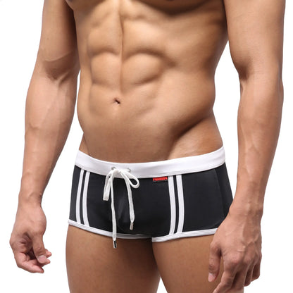 MetroMaleWear Fresco swim trunk black with white stripes and matching drawstring waistband for casual beachwear
