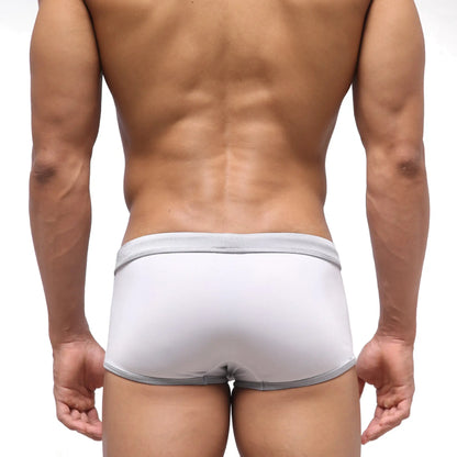 White briefs with subtle gray trim on waistband and legs from MetroMaleWear Fresco Swim Trunk Crystal 4944-00 collection