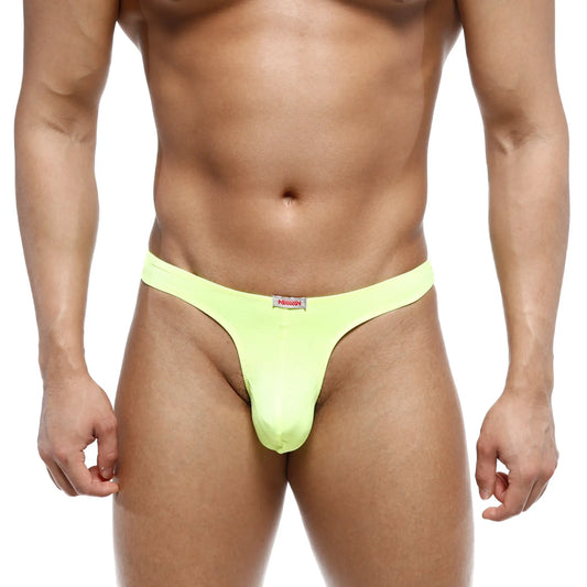 Bright neon green MetroMaleWear Fria thong with a small red and white brand tag at the waistband front view