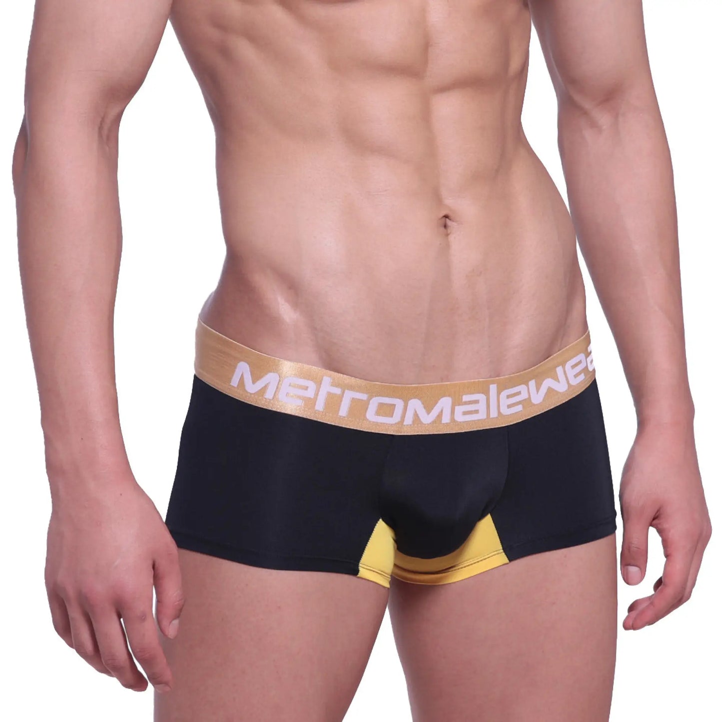 Black men’s briefs with gold waistband and yellow accents on leg openings from metromalewear goldmine short boxer
