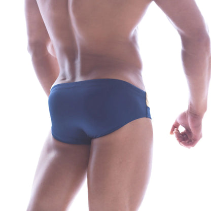 Navy blue MetroMaleWear Ibiza swim brief with gold metallic side seam accent ideal for stylish beachwear
