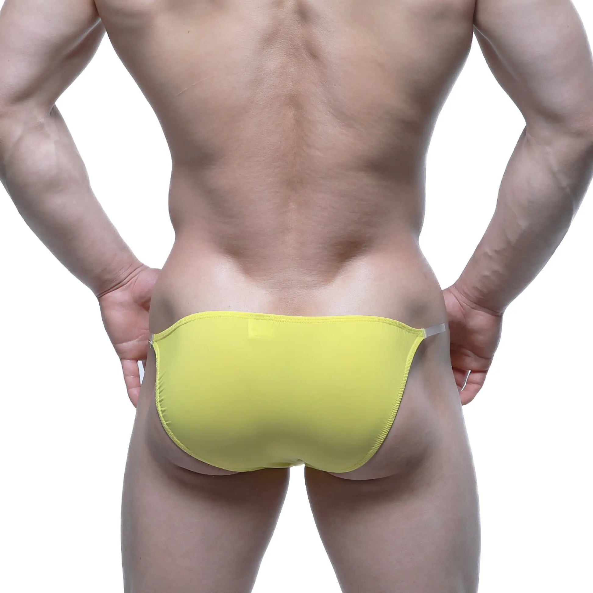 Bright yellow MetroMaleWear Invisible Bikini 3704-15 swim trunks with a sleek minimalist design and form-fitting style