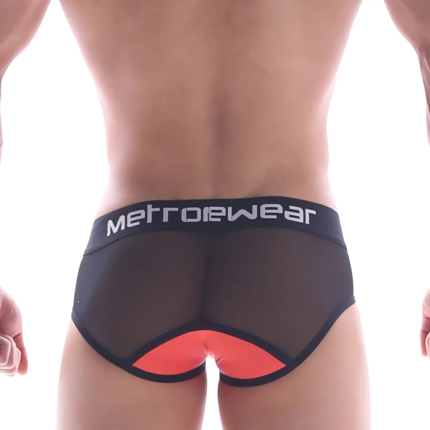 Black mesh briefs with vibrant orange triangular back accent and metrowear branded waistband from metromalewear joy mesh brief coral 9004-42