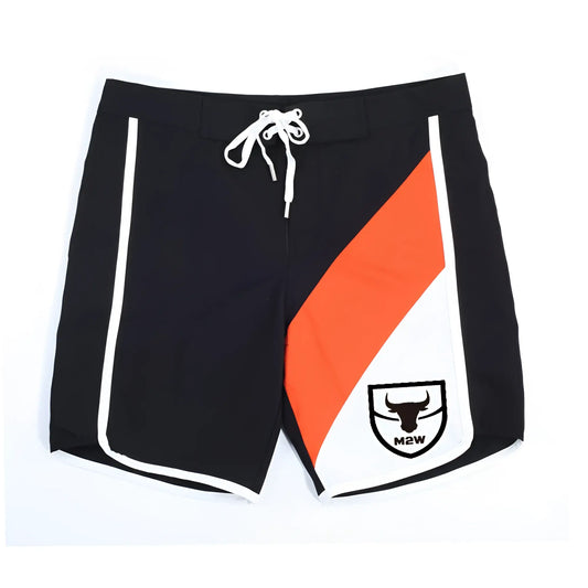 Black MetroMuscleWear board shorts with bold orange and white diagonal stripes and a white drawstring waistband.