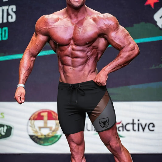Black and gray athletic board shorts with bold bull logo on the side from MetroMaleWear MetroMuscleWear Cafe Physique