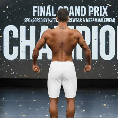 A muscular man wearing white metroMalewear metroMusclewear gold physique board shorts shown from the back