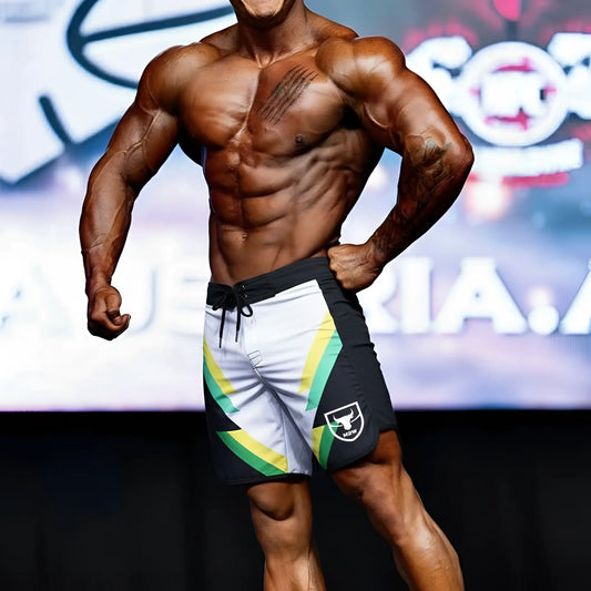 MetroMuscleWear IFBB Pro men’s physique board shorts in black, white, and green with diagonal stripes and shield logo.