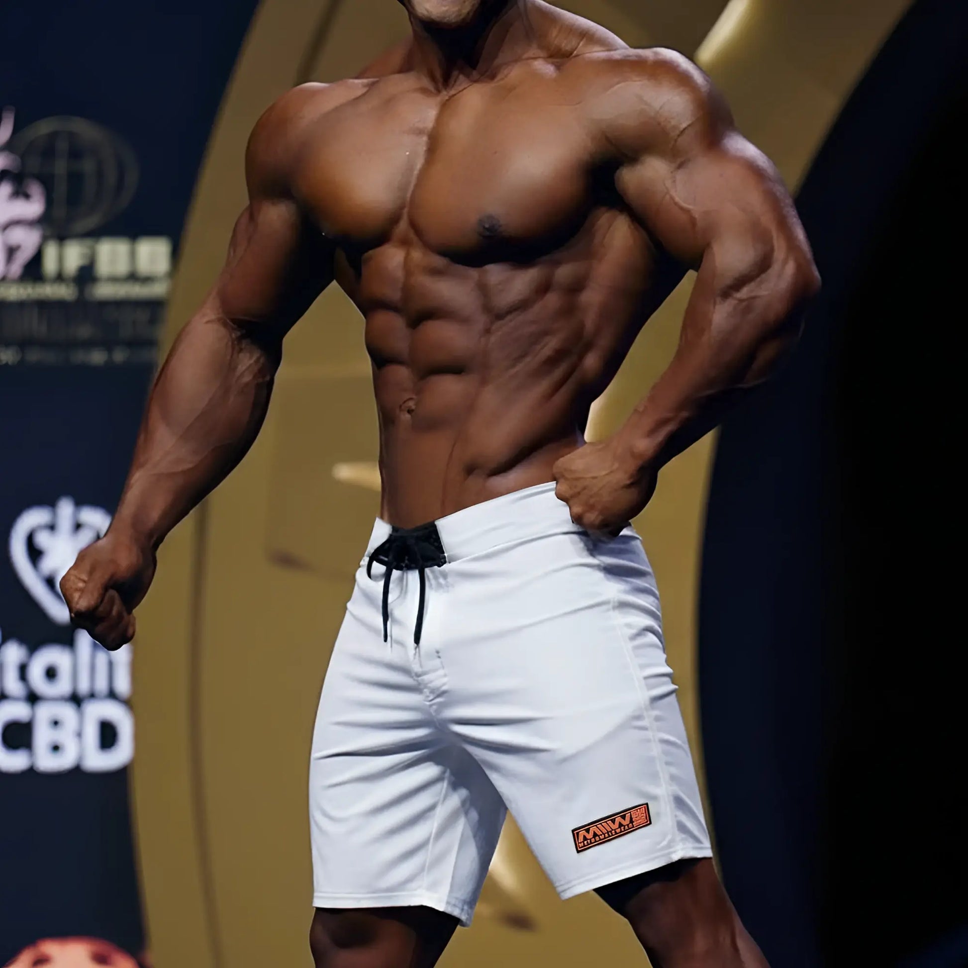MetroMaleWear Physique board short white with black drawstring and orange logo on lower right leg for athletic use