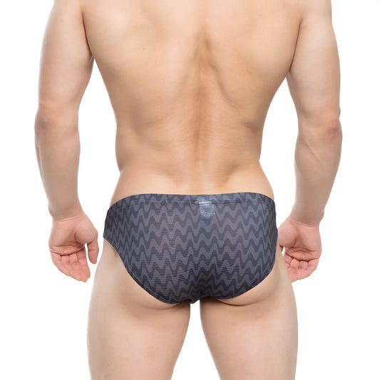 Dark gray swim trunks by metromalewear with a bold zigzag pattern suitable for beach and pool use