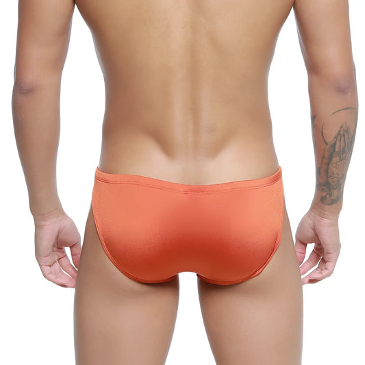 Orange textured silicon swim briefs by metro malewear in ochre designed for swimming and beachwear